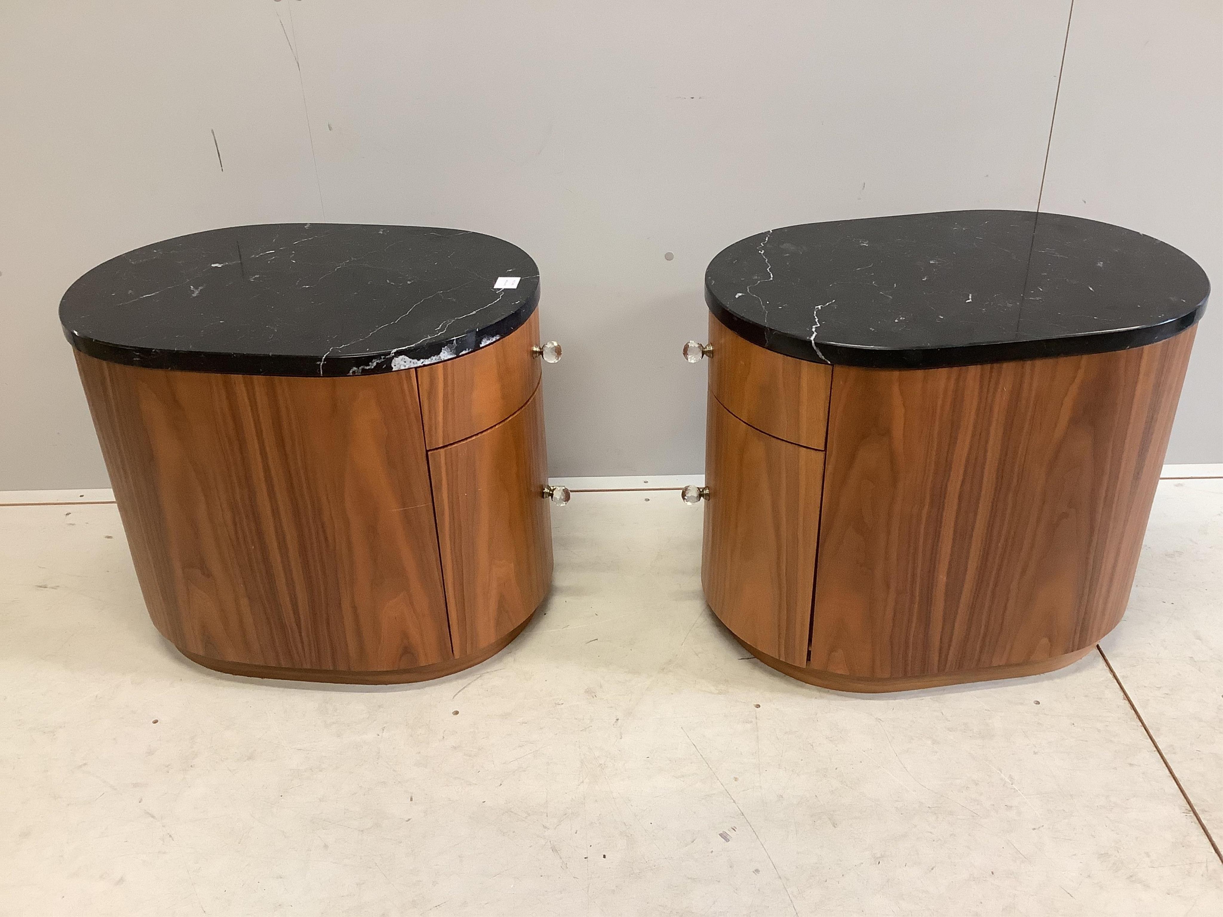 A pair of Contemporary black walnut and marble bedside cupboards, width 49cm, depth 67cm, height 56cm. Condition - fair to good